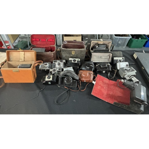 55 - Collection of old cameras and equipment including Halina and Kodak