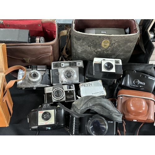 55 - Collection of old cameras and equipment including Halina and Kodak