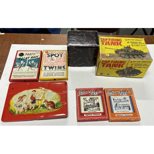 83 - Collection of old games together with a boxed 1970s Marx cap firing tank (Qty)