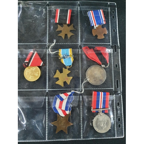 97 - Collection of 7 medals to include 2 British WWII a German WWI with bar, French medals etc (7)