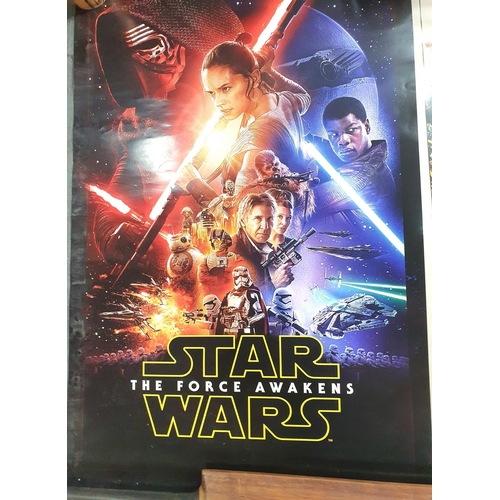 166 - Two Star Wars posters for the Force Awakens together with one for Star Wars, the Saga Continues, all... 