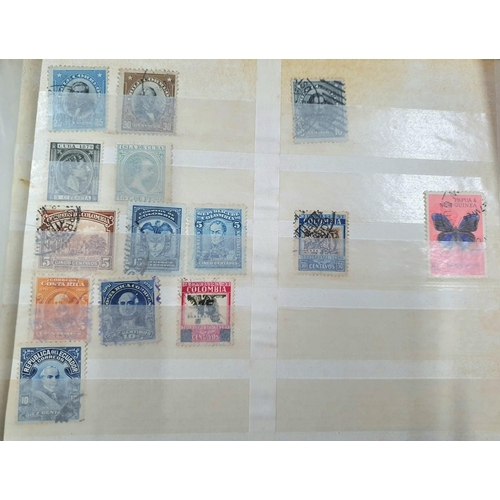 243 - Blue and red stock books both containing 20thC world mint and mainly used stamps, good section of Co... 