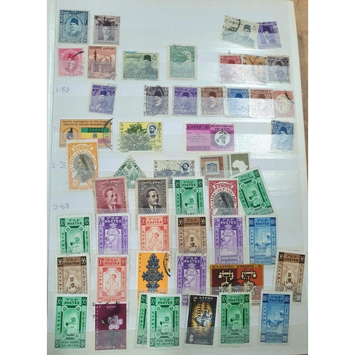 244 - Blue and green stock books both containing 20thC world mint and mainly used stamps, good section of ... 