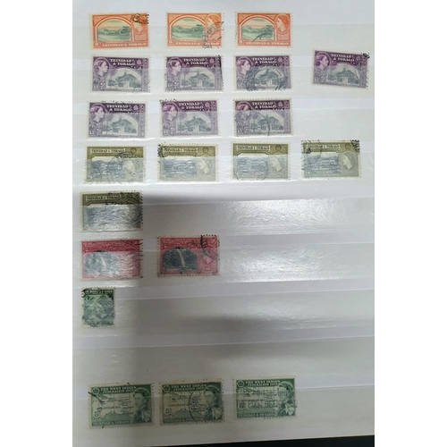 311 - Green and Blue stock albums containing Tristan da Cunha, Trinidad, Mauritius etc, QV to QEII mint an... 