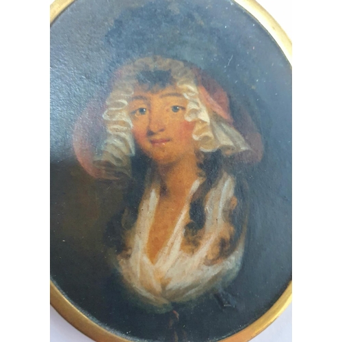 157 - Georgian unsigned oval oil on card miniature of a young lady in a bonnet in original gilt metal fram... 