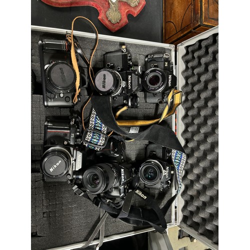 44 - Metal box of 6 Nikon cameras including F-501