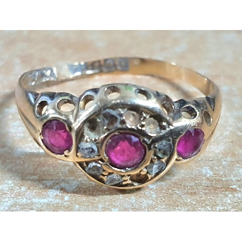 21 - Fully hallmarked Birmingham old 18ct yellow gold ring with a central ruby surrounded by a circular s... 