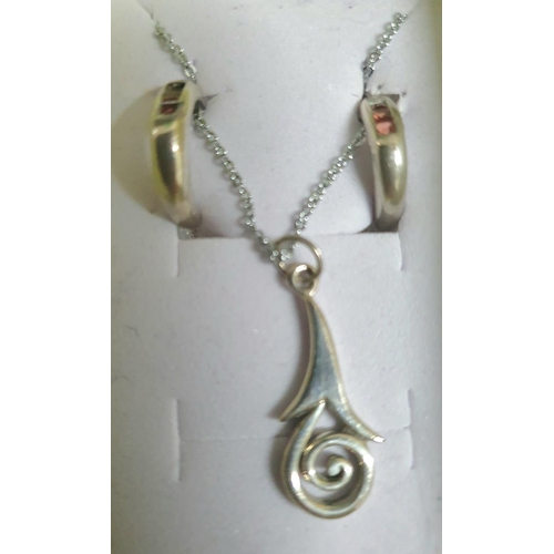 35 - Two silver necklaces' both with pendants and matching earrings and both in presentation boxes (2)