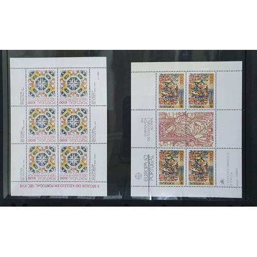 312 - Blue stock album containing mint unmounted Portugal 1910-1984 sets and mini-sheets, cat value £1,900... 