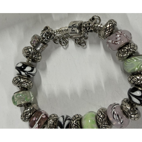 29 - Pandora bracelet with mostly 925 beads