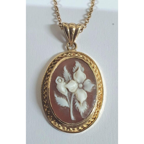 40 - 9ct gold mounted carved shell cameo pendant suspended from a fine 9ct gold,

4.5 grams gross        ... 