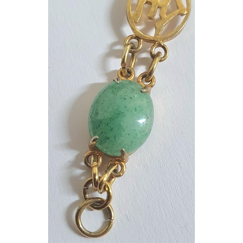 45 - Hong Kong spinach green jadeite and unmarked yellow metal mounted bracelet,

9.5 grams gross        ... 