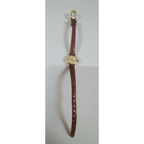 56 - Ladies vintage Longines wristwatch in slender brown leather strap