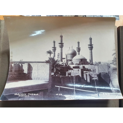 72 - Old black & white photograph album filled with photographs showing Singapore, Malasia and Bagdad