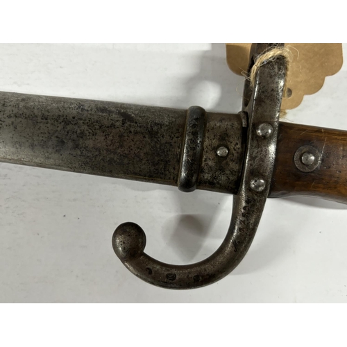 104 - 19th Century French chassepot bayonet with original steel scabbard and a 20th century Indian cavalry... 