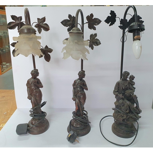 108 - Pair of cast metal figurine table lamps together with another single metal figurine table lamp (3)