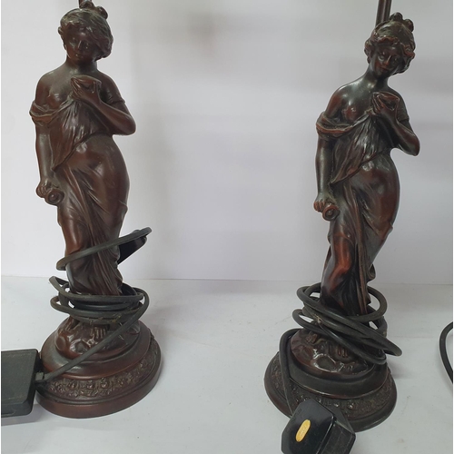 108 - Pair of cast metal figurine table lamps together with another single metal figurine table lamp (3)