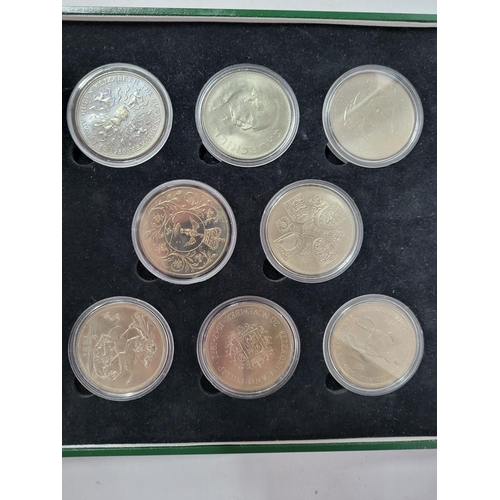 135 - GB QEII 5 shilling coin set 