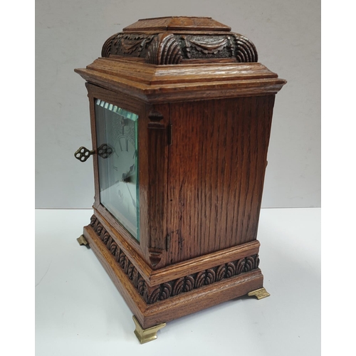 152 - W&H, Fine quality Oak cased clock with glazed front, with key and pendulum