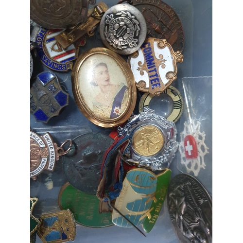 157 - Large quantity of small collectables to include medallions, late Victorian-later 20thC, enamel pin b... 