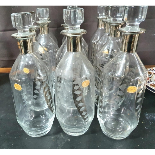 168 - Collection of 12 vintage Bohemia glass decanters all with matching silvered leaf decoration (12)