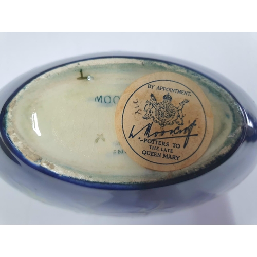 169 - Mid 20thC old Moorcroft Anemone pattern oval bowl with old paper label to base,

16cm long x 9cm tal... 