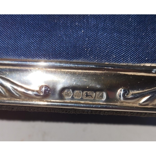 2 - 1996 Sheffield hallmarked silver fronted frame, 

measuring 9cm x 5.5cm