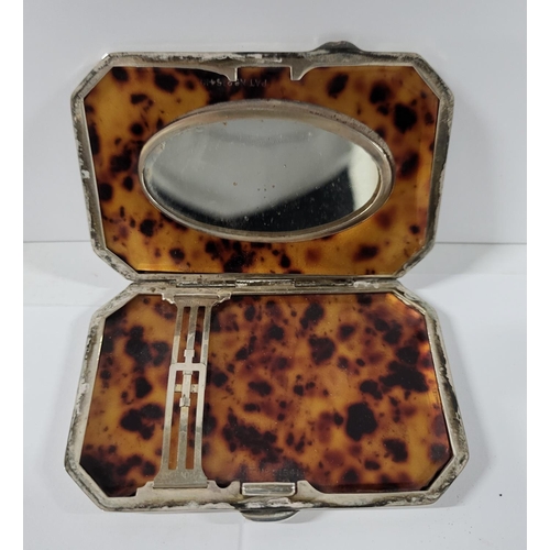 4 - 1974 Birmingham hallmarked silver compact with tortoise shell inlay, 

weighs 71 grams gross