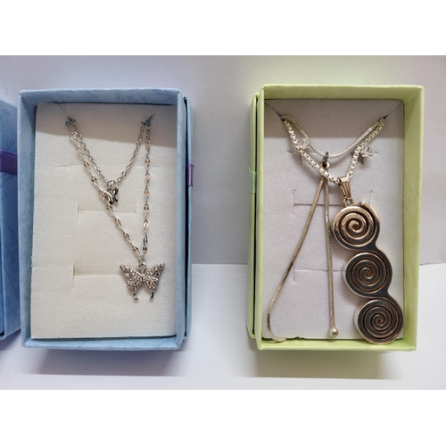 34 - Three silver necklaces all with various silver or stone pendants, all in presentation boxes (3)