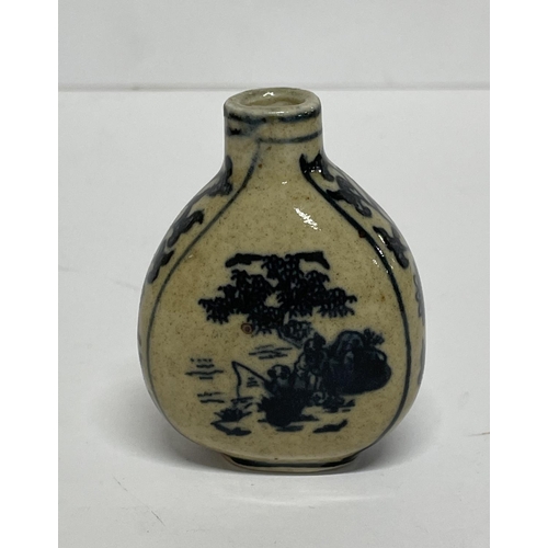 128 - Chinese biscuit ware snuff bottle together with a silver Ojimi (2).