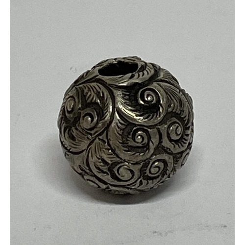 128 - Chinese biscuit ware snuff bottle together with a silver Ojimi (2).