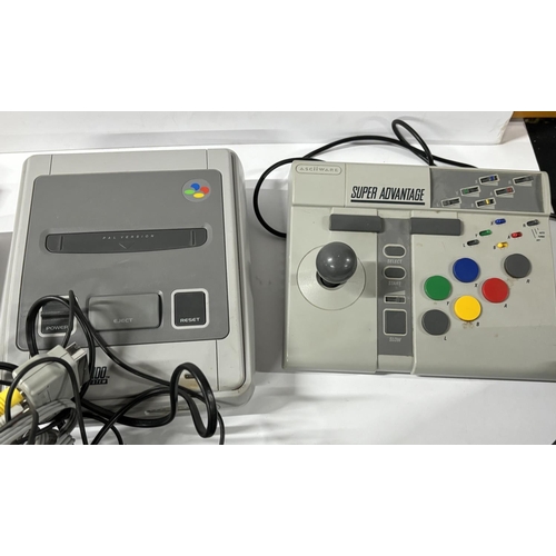 188 - Super Nintendo PAL console with games, controller, Super Advantage Joy stick and leads etc. (Qty)