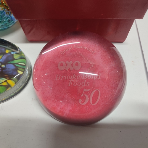 200 - Collection of various paperweights includng an Oxo 