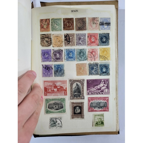 261 - Black stamp album containing British QV -QEII and world stamps, many 19thC examples together with ma... 