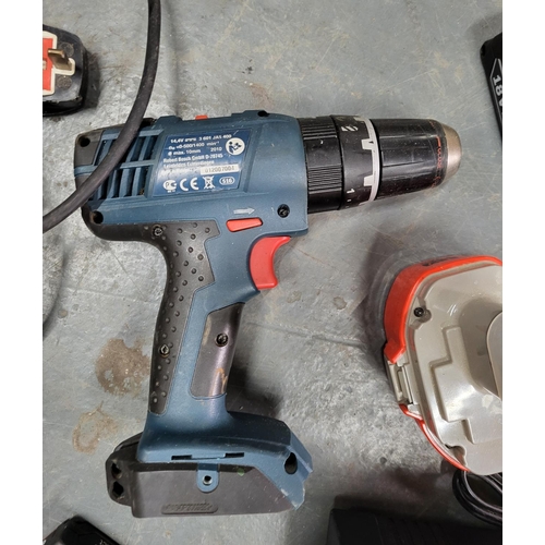 217 - Two Bosch drills, one electric, the other with 2 batteries and charger (2)