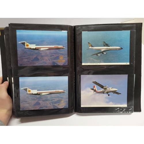 226 - Album containing 20thC colour postcards, mainly containing travel, air plane or car related examples... 