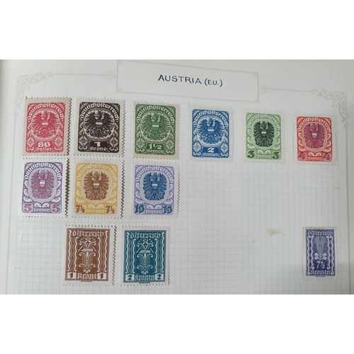 283 - Two old green stamp albums containing A and B countries, with good Austria including WWI postage set... 