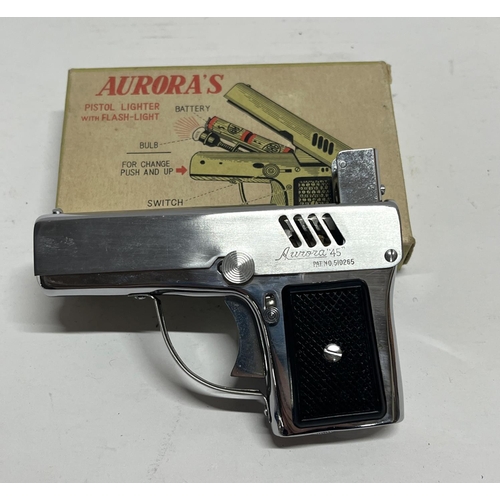 255 - Boxed vintage Aurora pistol lighter with flash light, as new