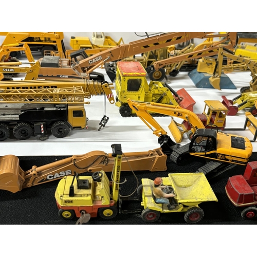 258 - Large Collection of diecast JCB Diggers and dump truck etc with other including Dinky, Matchbox, Cor... 