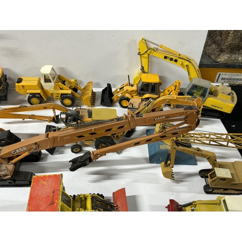 258 - Large Collection of diecast JCB Diggers and dump truck etc with other including Dinky, Matchbox, Cor... 