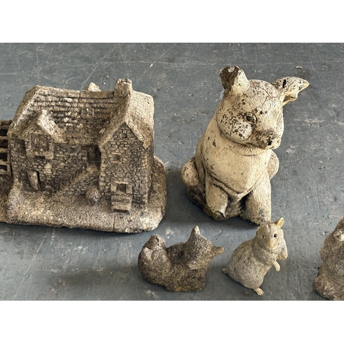 308 - Small collection of stoneware figures including a house and pig