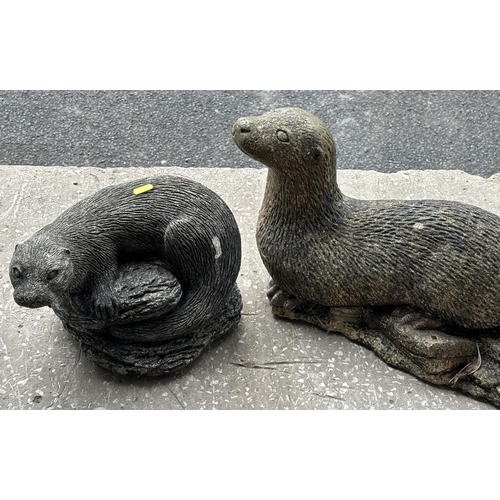 342 - Two concrete garden ornaments of Otters 

Biggest is 55cm Long