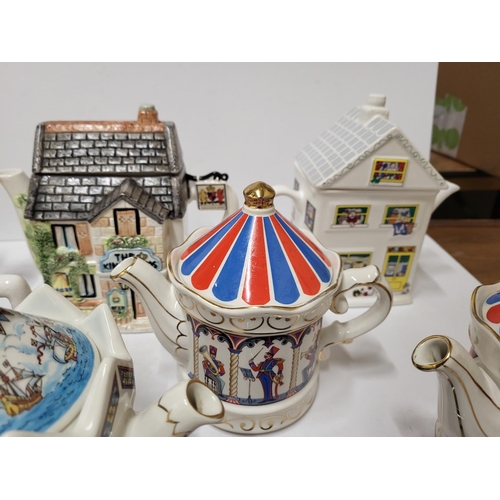 381 - Collection of various Novelty Sadler teapots and a Wade plate (Qty)