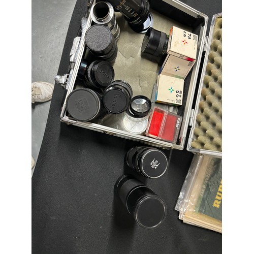 80 - Collection of camera lenses in metal box