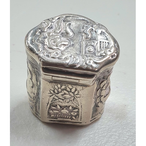 12 - Dutch 19thC silver pill box with beaten panel decoration,

15 grams