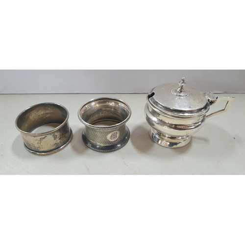 13 - Birmingham 1930 lidded mustard pot with blue glass liner together with 2 engraved silver napkins (3)... 