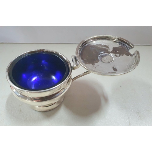 13 - Birmingham 1930 lidded mustard pot with blue glass liner together with 2 engraved silver napkins (3)... 