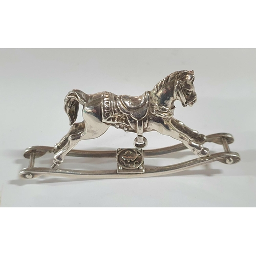 22 - Fine quality silver rocking horse together with a silver pin cushion in the form of a ladies shoe (2... 