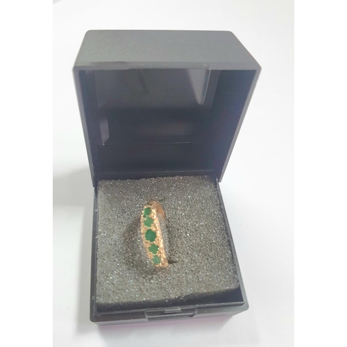 68 - 9ct yellow gold ring inset with 5 round cut Emeralds,


2.6 grams gross                 size F