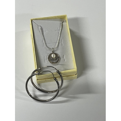 82 - Silver crystal pendant on chain with earrings along with 2 other pendants on chain and earrings (3)